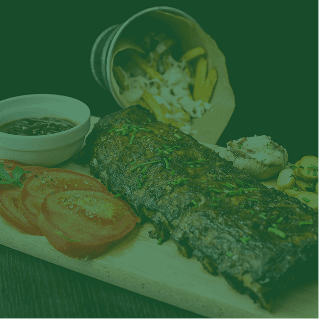 Charcoal-grilled ribs board with sides